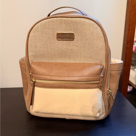 Itzy Ritzy Handbags - Itzy Ritzy Vanilla Latte Mini Baby Bag